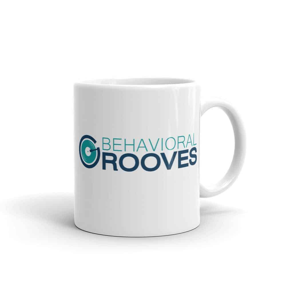 White mug with Behavioral Grooves logo